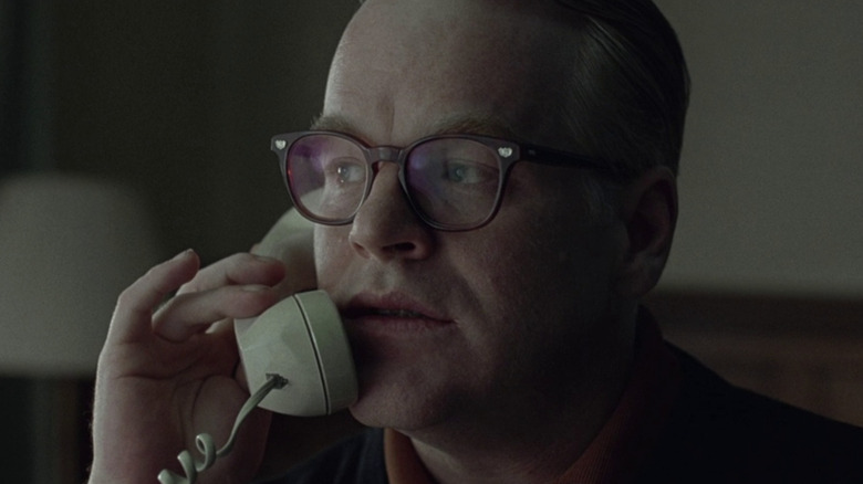 Capote talks on phone