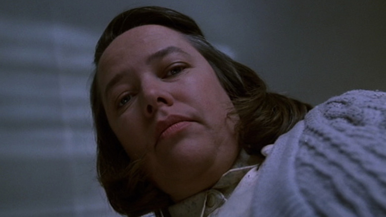 Annie Wilkes looks down at camera