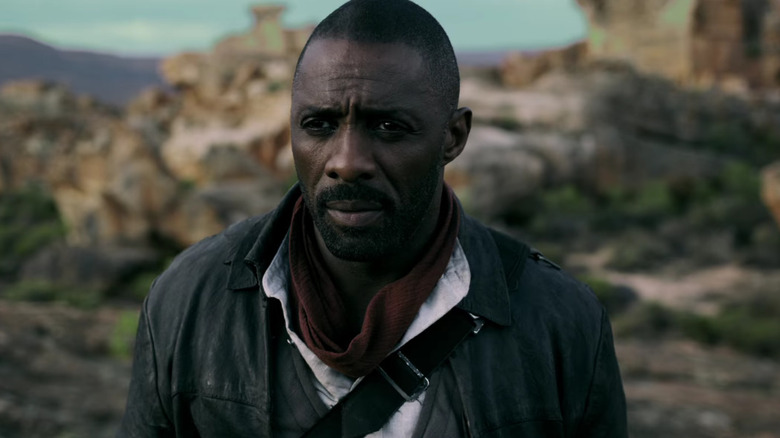 Idris Elba as Roland in the desert