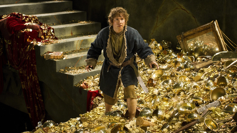 The Hobbit: The Desolation of Smaug's Bilbo running across gold