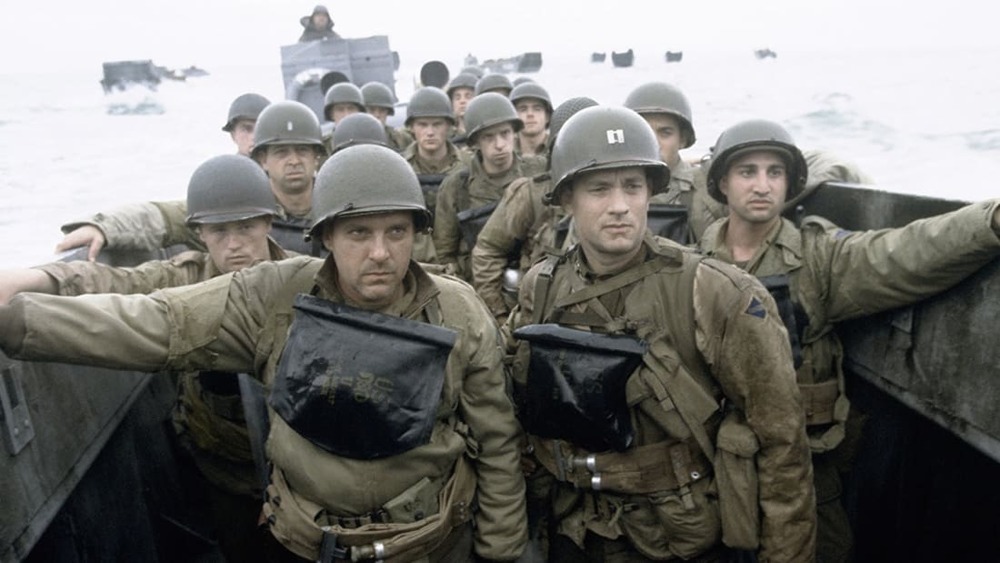 Tom Sizemore, Tom Hanks, and extras in Saving Private Ryan