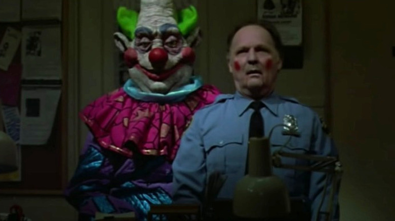 Killer Klown puppeting police officer