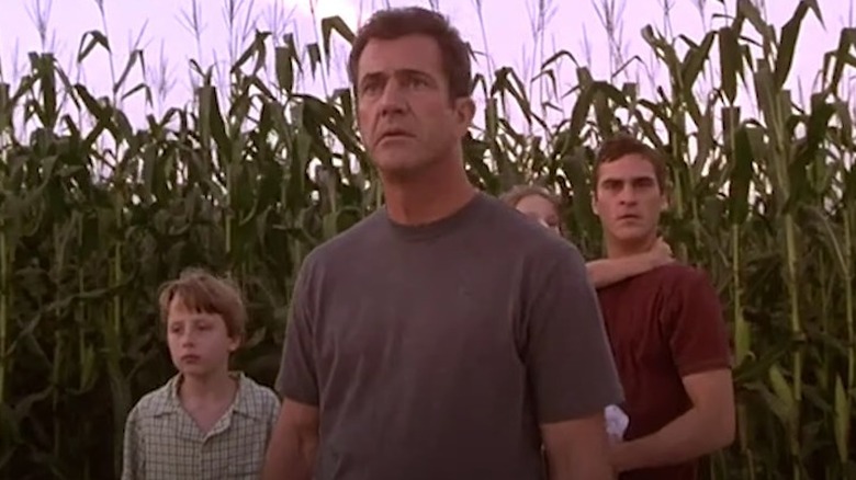 Graham Hess and kids in cornfield