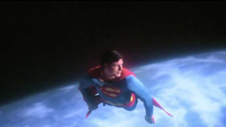 Superman flying past Earth