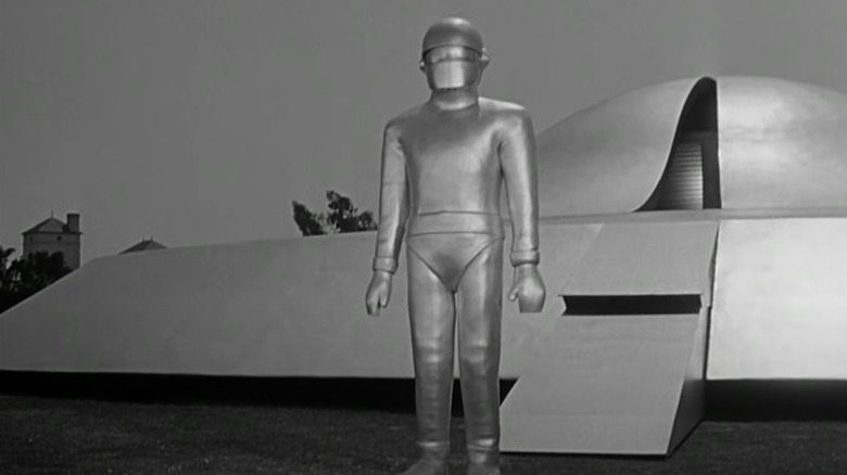 Gort standing by saucer