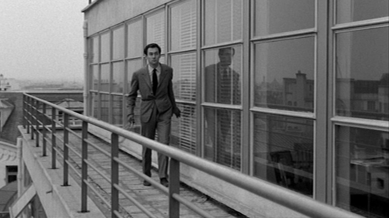 Maurice Ronet on building balcony