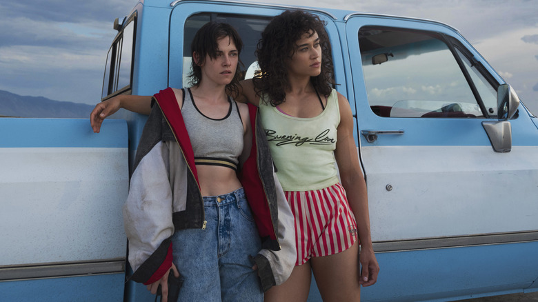 Lou and Jackie standing outside a truck in "Love Lies Bleeding"