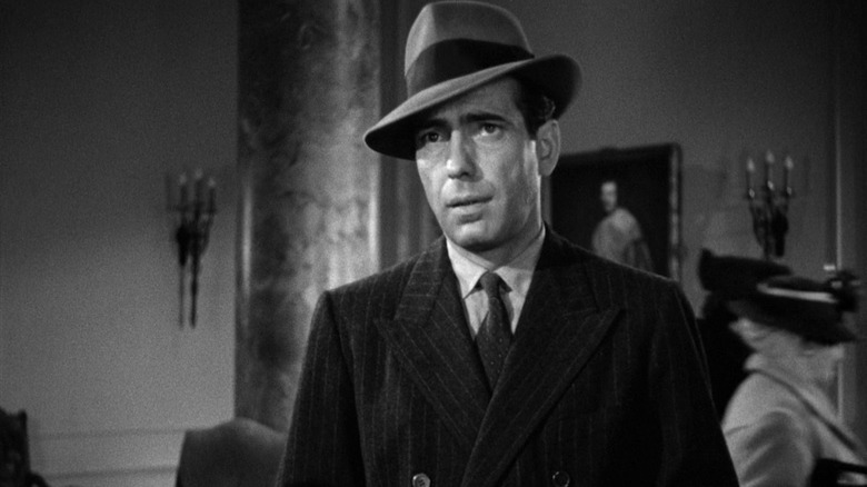 Sam Spade wearing a fedora