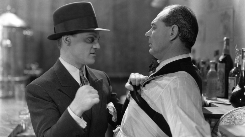 Cagney threatening a barman in The Public Enemy