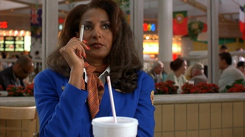 Jackie Brown smoking in food court