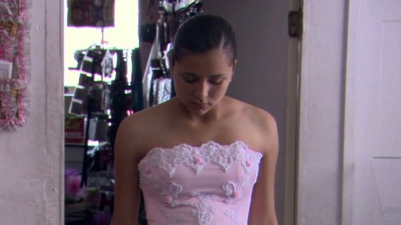 Emily Rios wearing pink dress