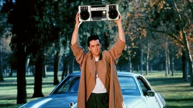 Lloyd holding up a boom box