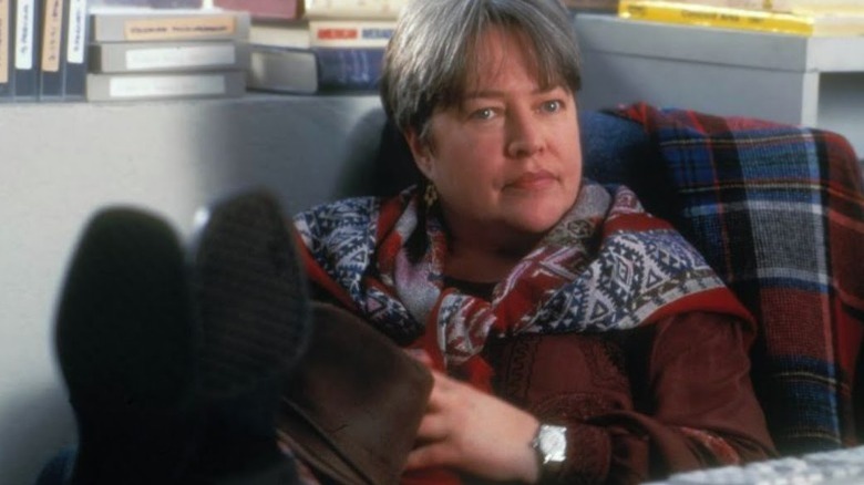 Libby Holden kicking up feet on desk