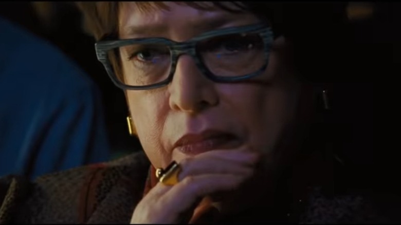 Kathy Bates as Barbara Haggermaker, frowning in contemplation