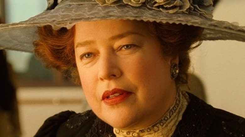 Kathy Bates as Molly Brown tilting her head