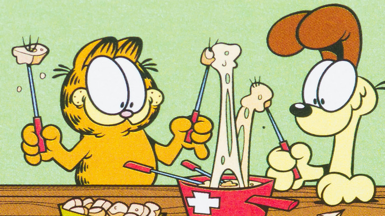 Garfield and Odie share fondue