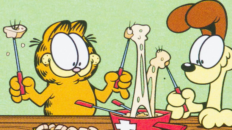 Garfield and Odie share fondue