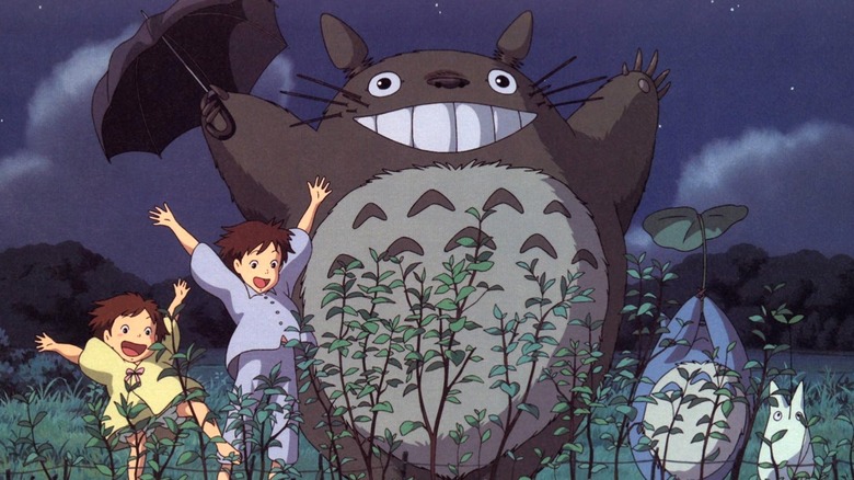 Totoro smiling with Satsuki and Mei