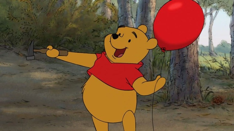 Winnie the Pooh with balloon