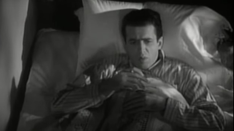 James Stewart in bed