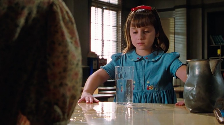 Matilda using powers on glass of water