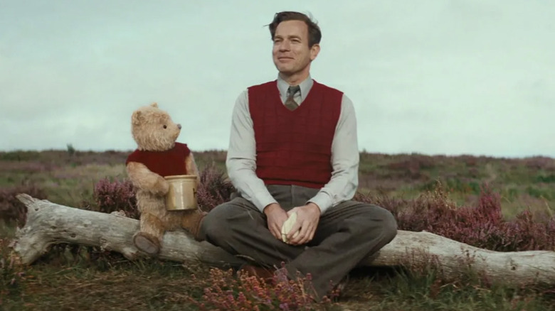 Ewan McGregor sitting with Winnie the Pooh