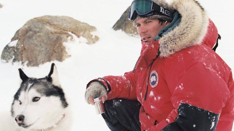 Paul Walker sits with dog