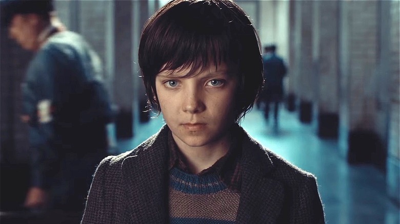 Asa Butterfield looking serious