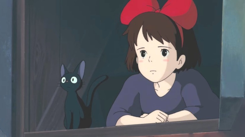 Kiki and cat look upset