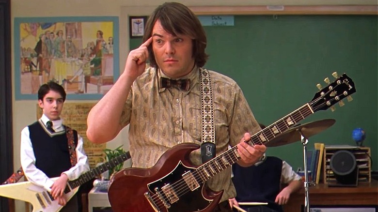 Jack Black plays guitar in classroom