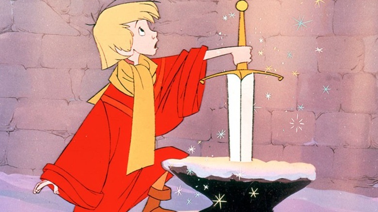 Arthur pulling the sword from the stone