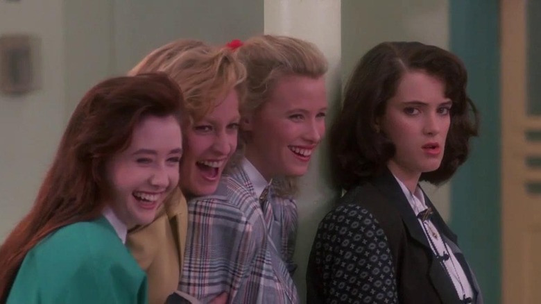 Heathers laughing with Veronica sneering