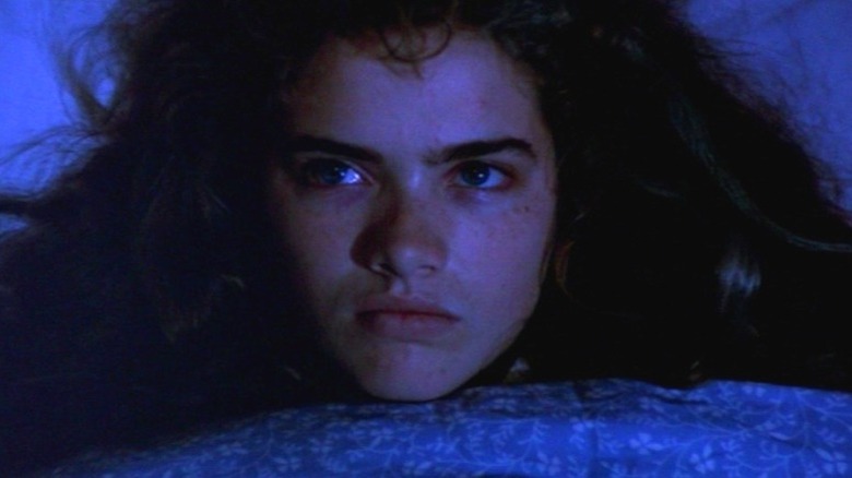 Nancy Thompson lies in bed