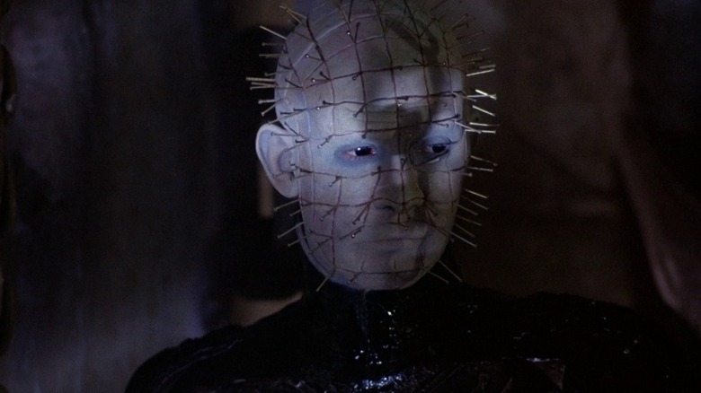 Pinhead stares from shadows