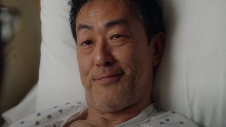 Chimney Han smiling in hospital bed