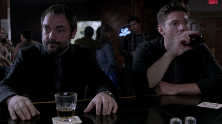 Dean and Crowley at a bar