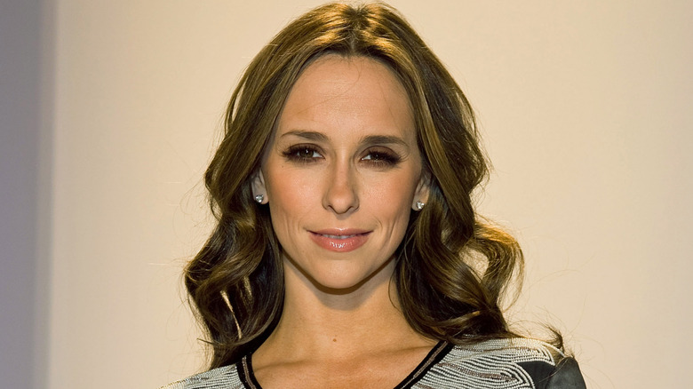 Jennifer Love Hewitt with small smile