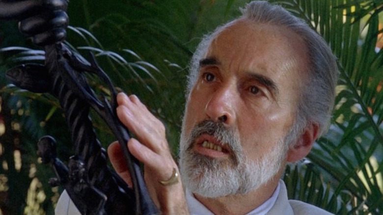 Sir Christopher Lee examines plant