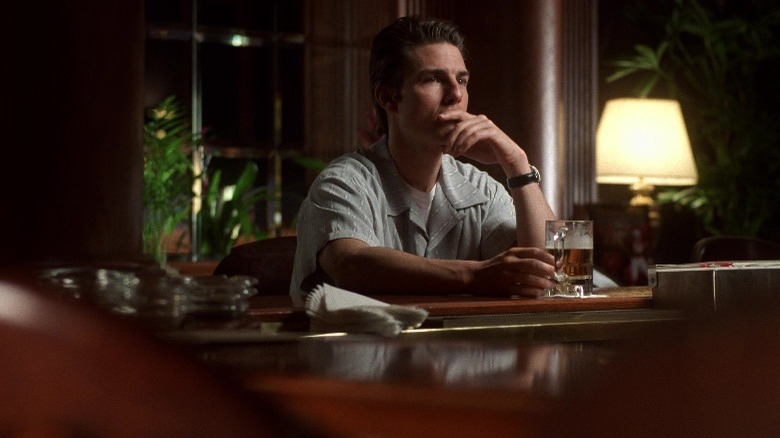 Jerry Maguire reflecting in a bar