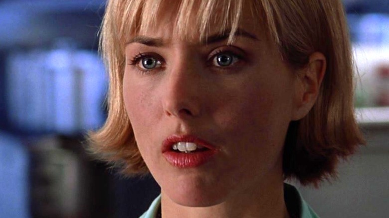 Téa Leoni is shocked in "Deep Impact"