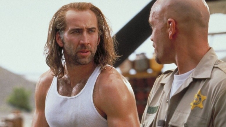 Cameron Poe talks to Cyrus "The Virus" Grissom in "Con Air" (1997)