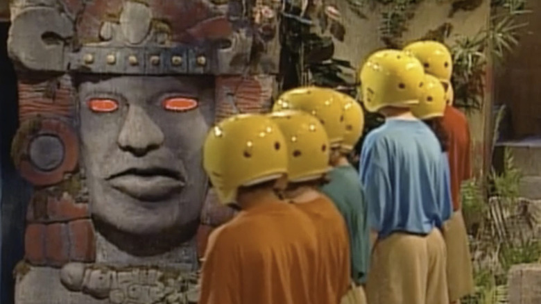 Olmec talks to players