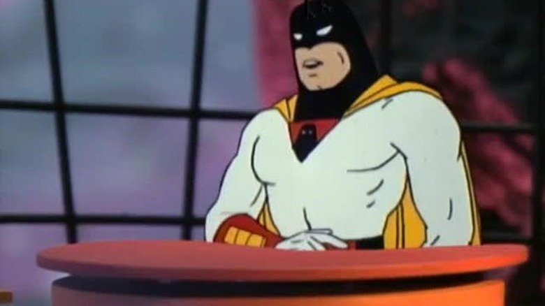 Space Ghost at desk