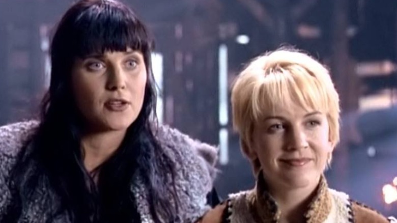 Xena looking shocked next to smiling Gabrielle