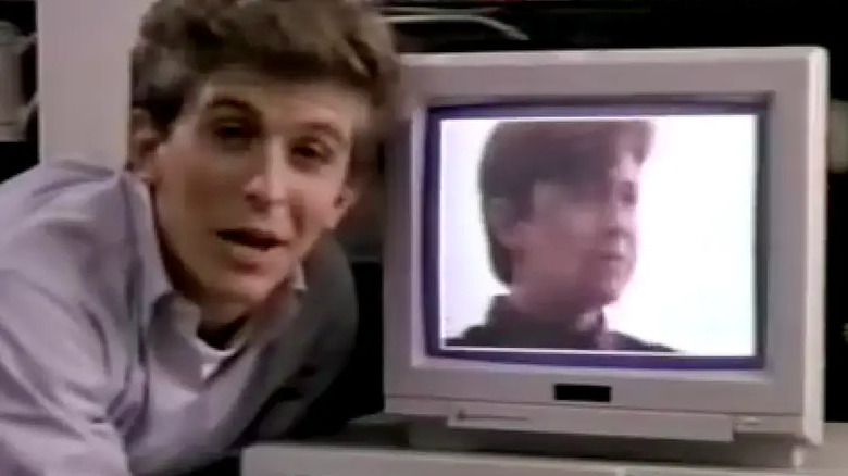 Charles Schlatter at a computer on Ferris Bueller