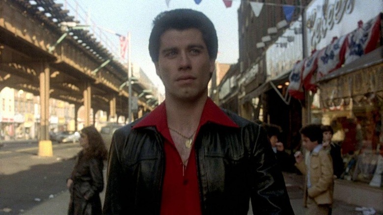 John Travolta walking down street