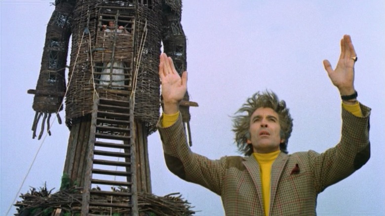 Christopher Lee in front of Wicker Man