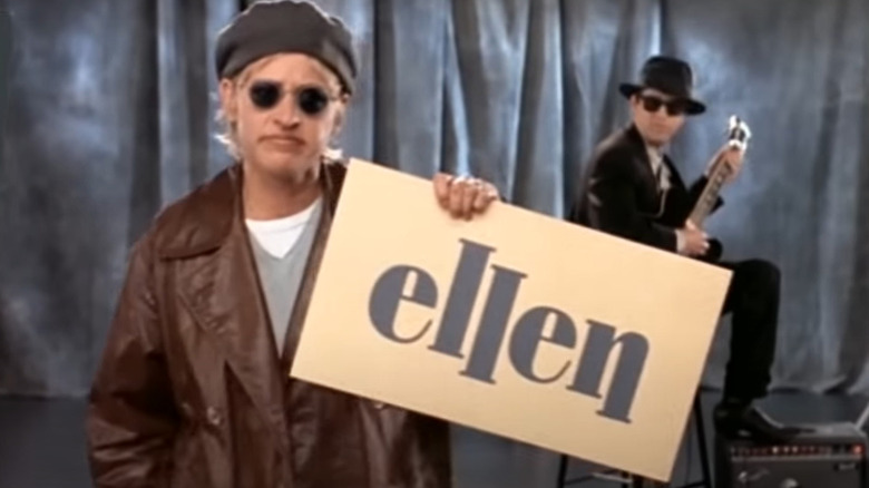 Ellen holds season 3 card