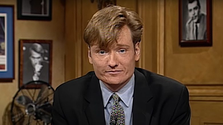 Conan O'Brien listening to laughter