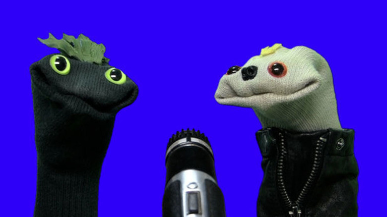 Sifl, Olly speak in front of a blue background